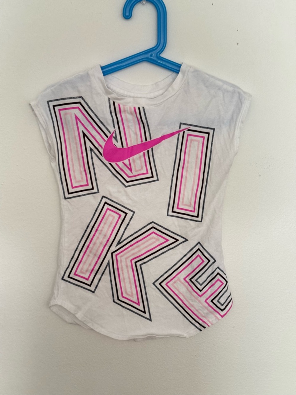 Nike White Tee with Pink Logo and Black Outline Graphic